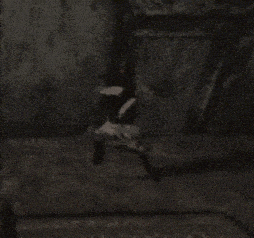 a blurry picture of a person standing in a room
