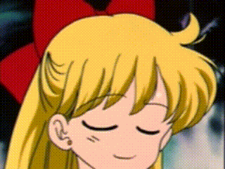 a close up of a cartoon girl with her eyes closed