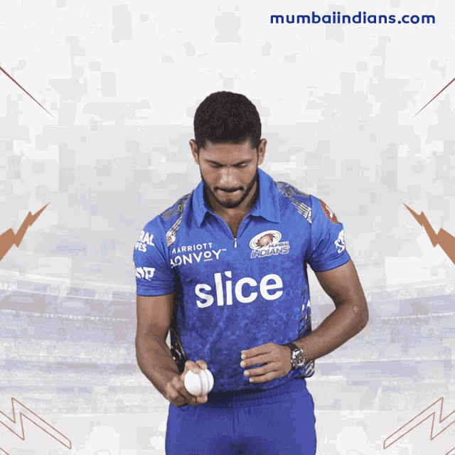 a man in a blue shirt that says slice