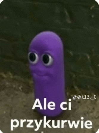 a purple worm with big eyes is standing next to a wall .