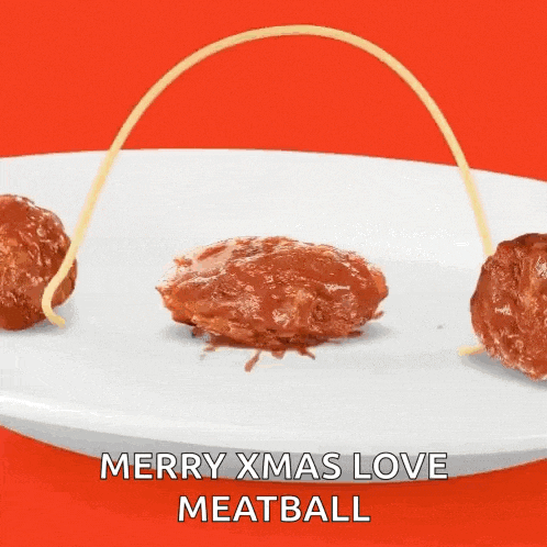 a plate of meatballs and spaghetti with the words merry xmas love meatball
