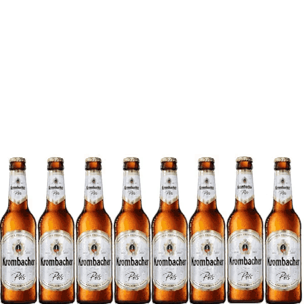 a row of bottles of krombacher beer are lined up in a row