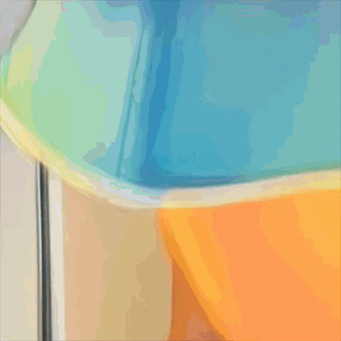 a person wearing a blue shirt with a yellow stripe on the waist