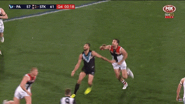 a football game is being played on fox sports