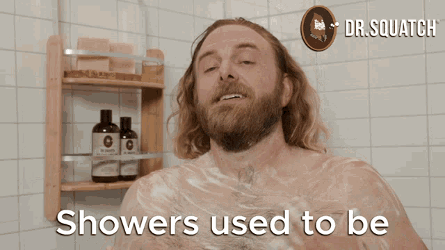 a man in a shower with the words showers used to be