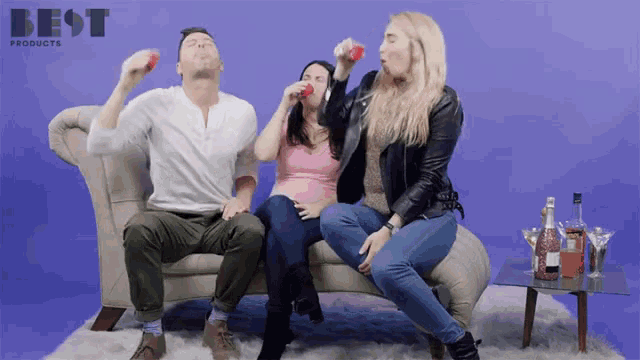 a group of people sitting on a couch with best products written on the top