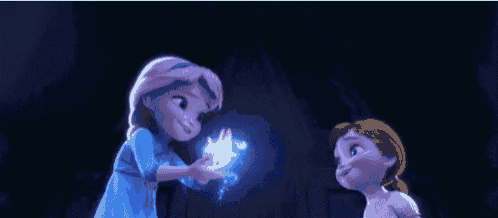 elsa and anna from frozen are standing next to each other in a dark room holding a blue light .