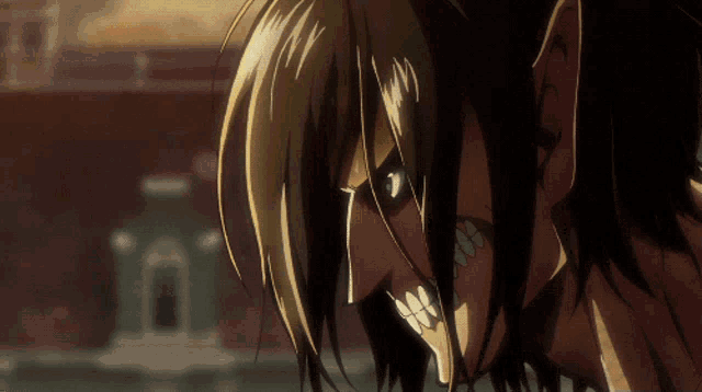 a close up of a person 's face with a very angry look on their face