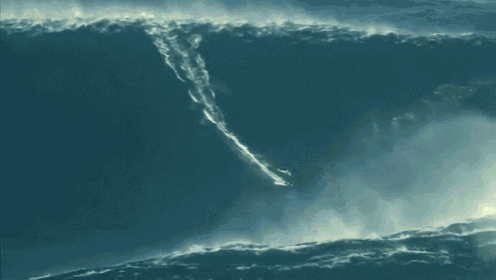 a person riding a wave in the ocean