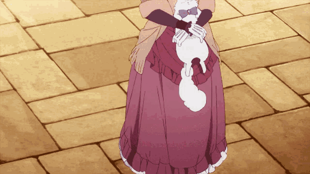 a woman in a purple dress holds a white cat in her arms