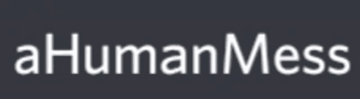 a gray background with the words ahuman mess in white letters