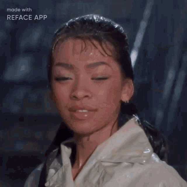 a woman is holding a cat in her arms and the app says reface app