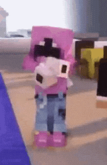 a pink minecraft character is standing on a carpet