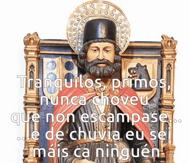 a statue of a man with a beard is surrounded by text in a foreign language