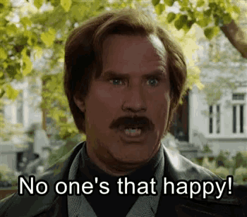 a man with a mustache is making a funny face and saying no one 's that happy .