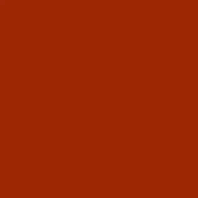 a close up of a red background that looks like a brick wall .