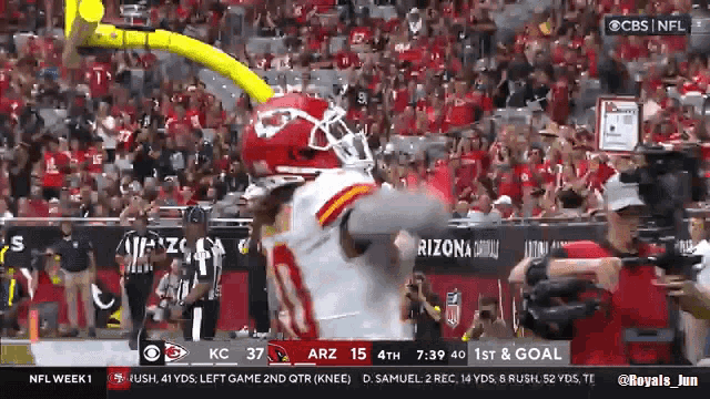a football game is being played on cbs