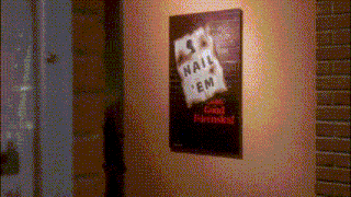a poster on a wall that says nail em on it