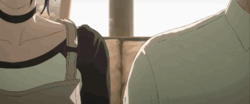 a man and a woman are sitting next to each other and the woman has a choker around her neck