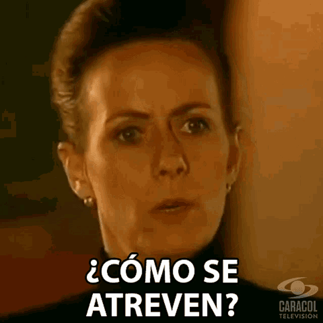 a woman is making a funny face and says `` como se atreven ? ''