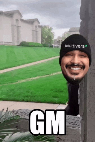 a man wearing a hat that says " multivers " on it