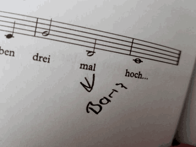 a close up of a sheet of music that says drei mal hoch and bart