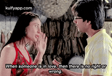 a man and a woman are talking to each other in a movie .