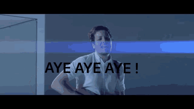 a man singing a song with the words aye aye aye