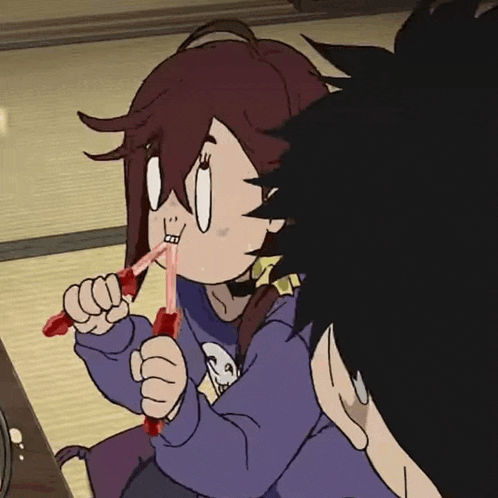 a girl in a purple sweatshirt is holding a straw in her mouth