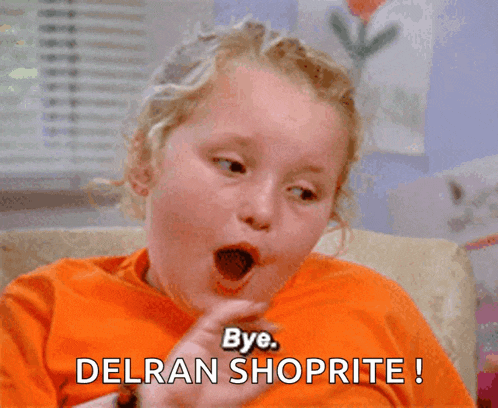 a girl in an orange shirt says bye delran shoprite on the screen