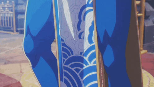 a person in a blue and white outfit with waves on the back