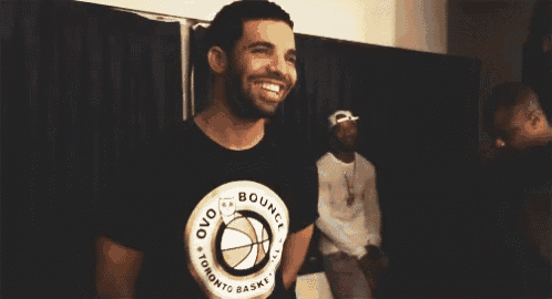a man wearing a black shirt that says ovo bounce toronto basketball