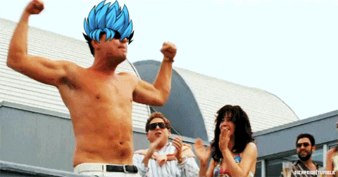 a shirtless man with a blue haired character on his head stands in front of a group of people