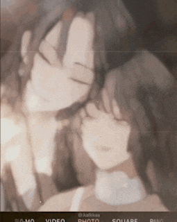 a couple of anime girls hugging each other with the words square and video visible on the bottom