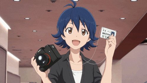 a girl with blue hair is holding a camera and a id card