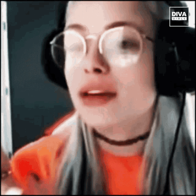 a woman wearing glasses and headphones with diva direct written on the corner