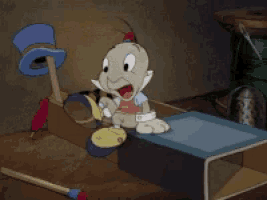 a cartoon character sitting on a box with a top hat