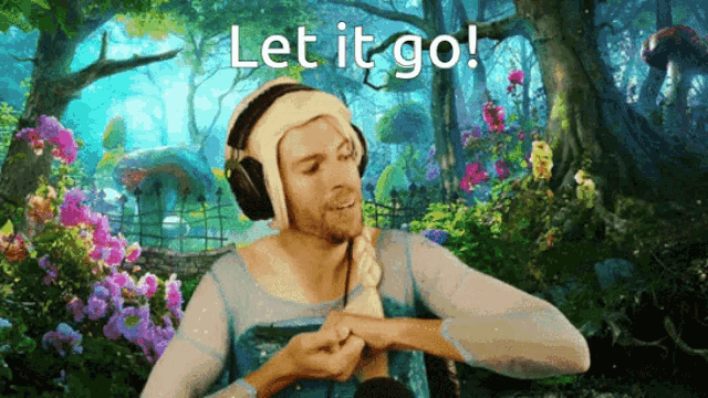 a man wearing headphones and a wig says " let it go "