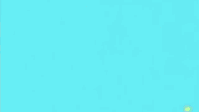 a girl in a blue dress is standing in a room