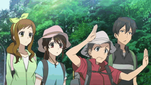 a group of anime characters are standing next to each other in a forest