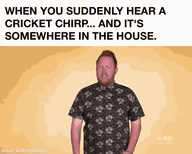 a man in a floral shirt is making a funny face