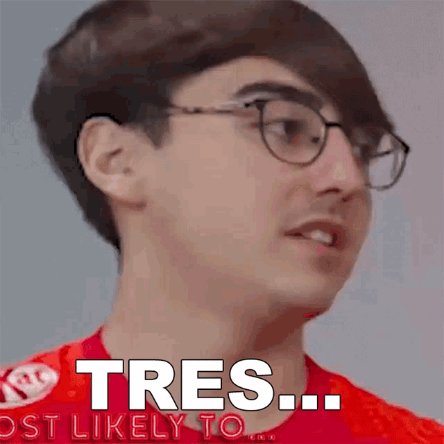a man wearing glasses and a red shirt with the words tres ost likely to