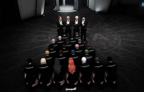 a group of people are kneeling down in front of a sign that says ' cia ' on it