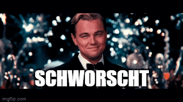 a man in a tuxedo is smiling with schworscht written in white letters