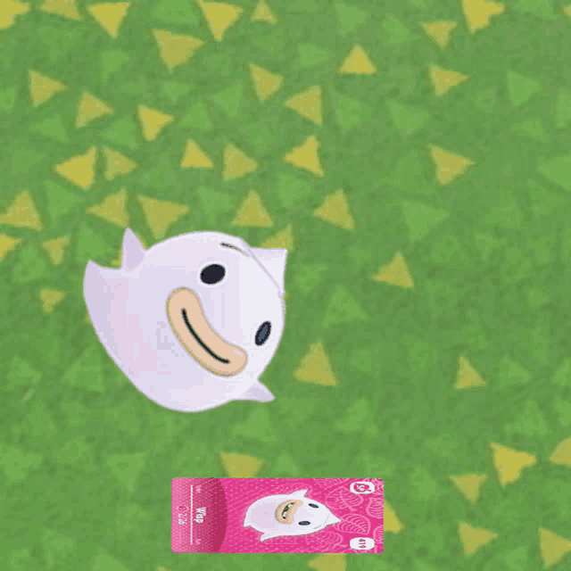 a pink animal crossing card with a white ghost on top of it
