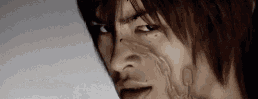 a close up of a man 's face with a skeleton coming out of it .