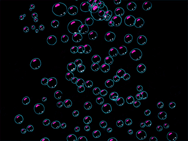 a bunch of soap bubbles are floating in the air on a black background