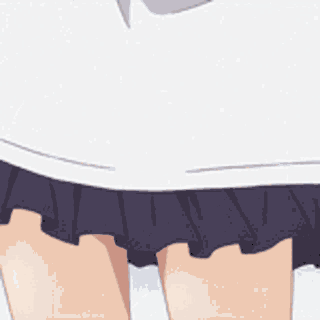 a close up of a person 's bottom in a skirt .