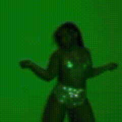 a close up of a woman 's face on a green background