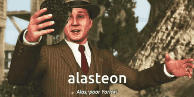 a man in a suit and tie with alasteon written on the bottom
